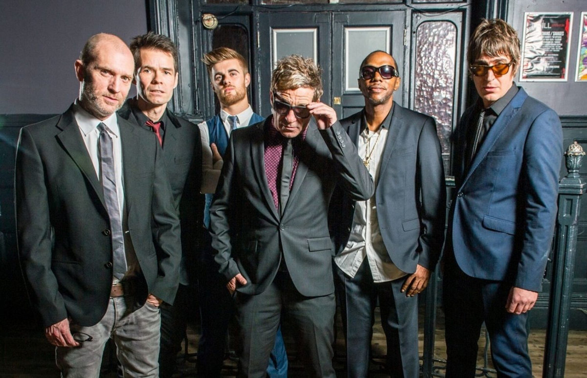 The Dub Pistols posing in suits.