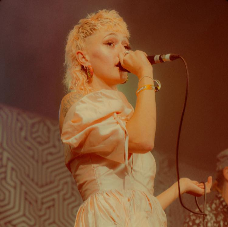 Kayco' performing onstage.