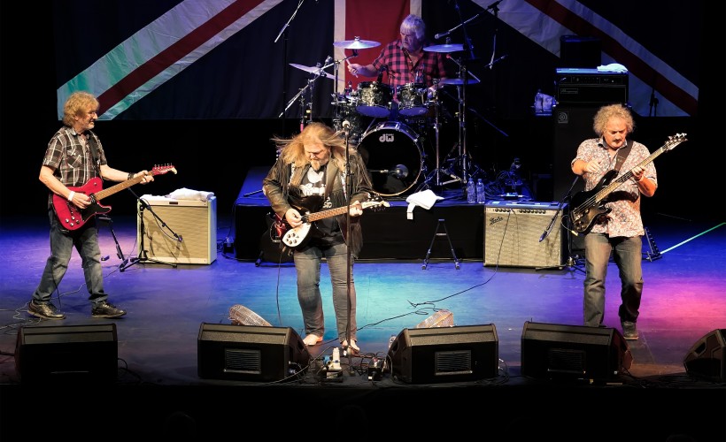 Clearwater Creedence Revival performing onstage.