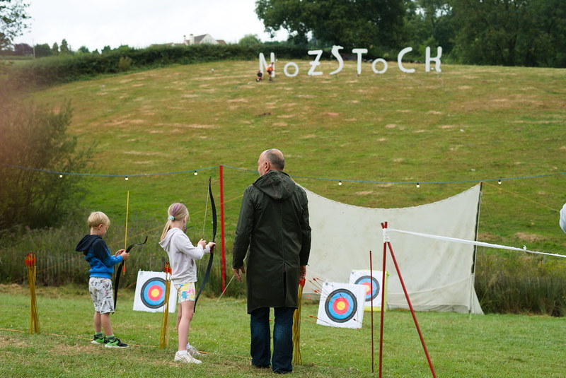 Picture of Golden Lotus Archery demonstrating how to shoot a bow and arrow