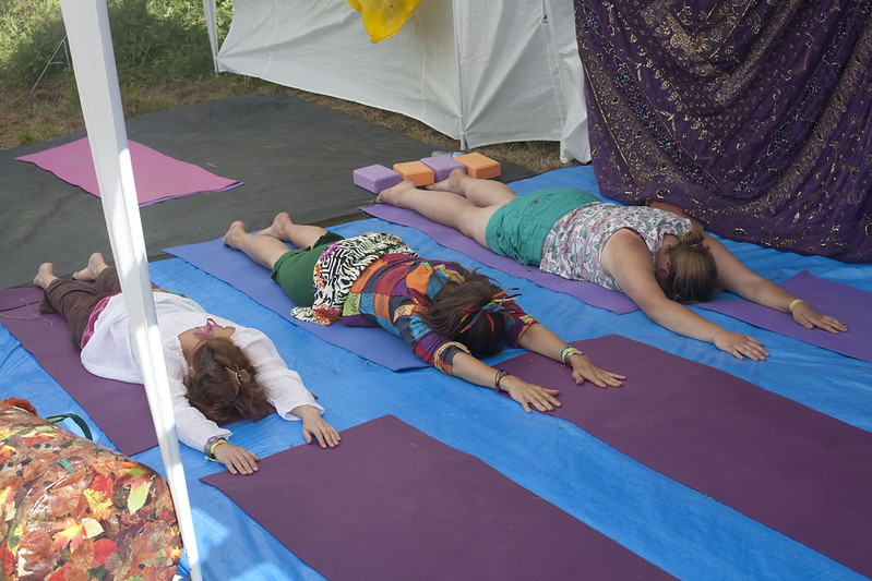 Picture of people doing yoga at an event